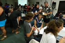Dean Maria Gallo and student at aquaponics workshop